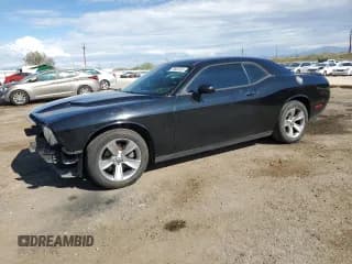 ✅ 2015 Dodge Challenger SXT • VIN: 2C3CDZAG1FH798602 • Lot: 70865205. Wystawiony na Copart z przebiegiem 130 469 mil. Bezpłatny archiwum sprzedaży aukcyjnych z USA i szczegółowy raport historii pojazdu na DreamBid. Zdjęcie 1.