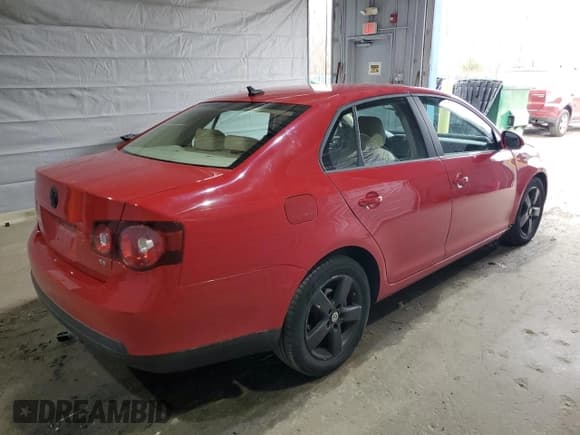 ✅ 2009 Volkswagen Jetta SE • VIN: 3VWRZ71K69M011873 • Lot: 52881525. Listed on Copart with 154,441 mi. Free auction sales archive from the USA and detailed vehicle history report at DreamBid. Image 3.