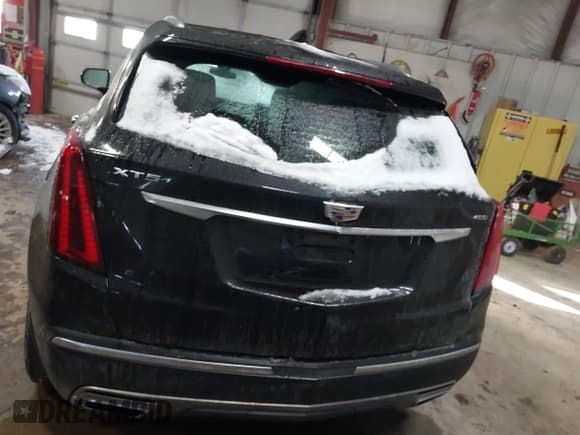 ✅ 2021 Cadillac XT5 FWD Premium Luxury • VIN: 1GYKNCRS3MZ198651 • Lot: 41607734. Listed on IAAI with 49,275 mi. Free auction sales archive from the USA and detailed vehicle history report at DreamBid. Image 16.