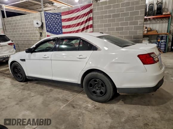 ✅ 2013 Ford Police Interceptor • VIN: 1FAHP2M82DG130472 • Lot: 96915135. Listed on Copart with 187,519 mi. Free auction sales archive from the USA and detailed vehicle history report at DreamBid. Image 2.