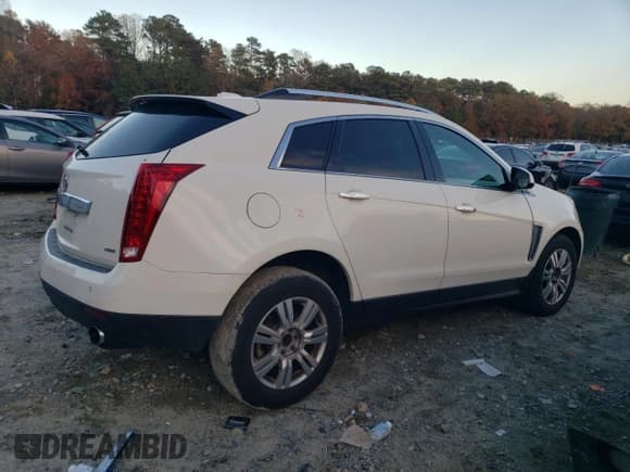 ✅ 2016 Cadillac SRX Luxury Collection • VIN: 3GYFNBE34GS526185 • Lot: 91393335. Listed on Copart with 207,373 mi. Free auction sales archive from the USA and detailed vehicle history report at DreamBid. Image 3.
