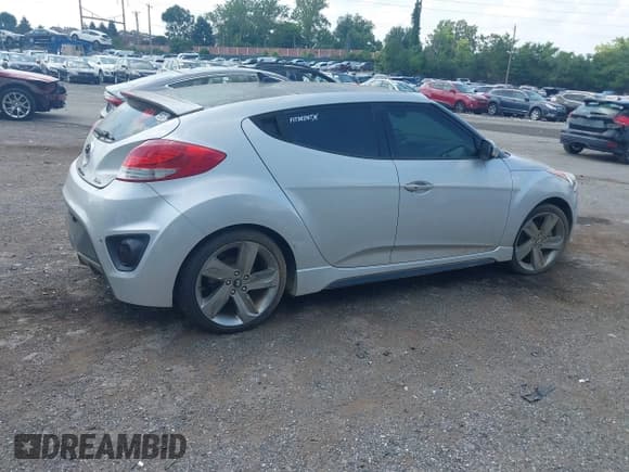✅ 2013 Hyundai Veloster Turbo • VIN: KMHTC6AE1DU177023 • Lot: 42604617. Listed on IAAI with 102,087 mi. Free auction sales archive from the USA and detailed vehicle history report at DreamBid. Image 4.
