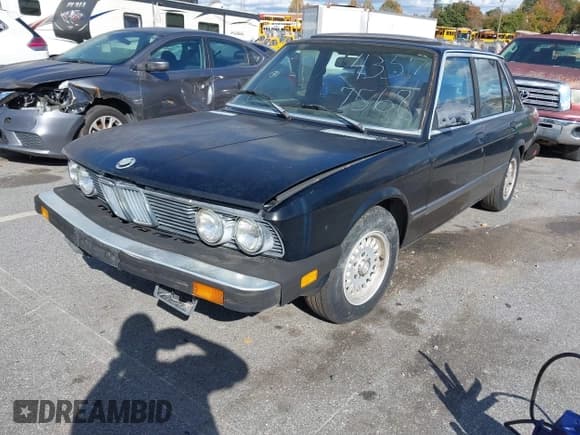 ✅ 1986 BMW 5 Series 528e • VIN: WBADK8308G9658089 • Lot: 43577568. Listed on IAAI with 221,132 mi. Free auction sales archive from the USA and detailed vehicle history report at DreamBid. Image 2.