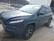 ✅ 2016 Jeep Cherokee Trailhawk • VIN: 1C4PJMBS7GW183731 • Lot: 43584556. Listed on IAAI with 123,183 mi. Free auction sales archive from the USA and detailed vehicle history report at DreamBid. Image 2.