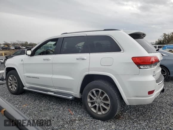 ✅ 2015 Jeep Grand Cherokee Overland • VIN: 1C4RJFCG8FC748938 • Lot: 46275425. Listed on Copart with 102,113 mi. Free auction sales archive from the USA and detailed vehicle history report at DreamBid. Image 2.