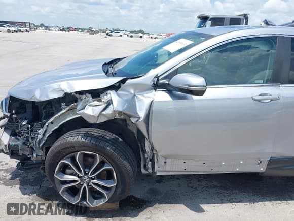 ✅ 2022 Honda CR-V EX • VIN: 2HKRW2H5XNH647694 • Lot: 42691613. Listed on IAAI with 40,040 mi. Free auction sales archive from the USA and detailed vehicle history report at DreamBid. Image 18.