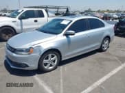 ✅ 2012 Volkswagen Jetta TDI w/Premium & Nav • VIN: 3VWLL7AJ8CM314305 • Лот: 42853904. Опубликован ранее на IAAI с пробегом 75 669 миль. Бесплатный доступ к архиву аукционных продаж из США и подробный отчёт об истории автомобиля на DreamBid. Изображение 2.