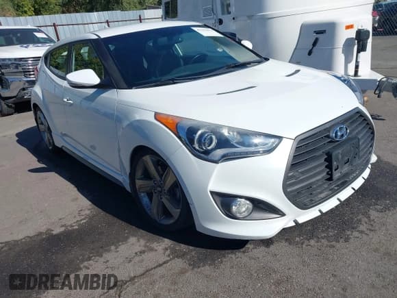 ✅ 2014 Hyundai Veloster Turbo • VIN: KMHTC6AE2EU183673 • Lot: 43193034. Wystawiony na IAAI z przebiegiem 42 726 mil. Bezpłatny archiwum sprzedaży aukcyjnych z USA i szczegółowy raport historii pojazdu na DreamBid. Zdjęcie 1.