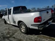 ✅ 1998 Ford F-150 XL • VIN: 1FTZX08W6WKA55383 • Lot: 80040264. Listed on Copart with 180,786 mi. Free auction sales archive from the USA and detailed vehicle history report at DreamBid. Image 11.