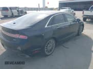 ✅ 2014 Lincoln MKZ Hybrid • VIN: 3LN6L2LU3ER804887 • Lot: 43212099. Listed on IAAI with 195,399 mi. Free auction sales archive from the USA and detailed vehicle history report at DreamBid. Image 4.