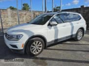 ✅ 2018 Volkswagen Tiguan S • VIN: 3VV1B7AX7JM081081 • Lot: 91599275. Listed on Copart with 56,400 mi. Free auction sales archive from the USA and detailed vehicle history report at DreamBid. Image 1.