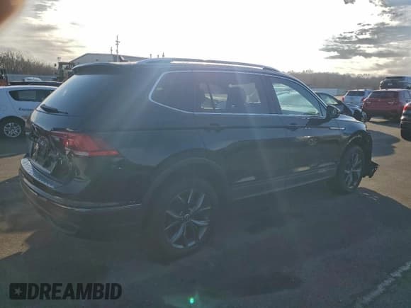 ✅ 2022 Volkswagen Tiguan SE • VIN: 3VV2B7AX2NM133663 • Лот: 95056935. Опубликован ранее на Copart с пробегом 97 393 миль. Бесплатный доступ к архиву аукционных продаж из США и подробный отчёт об истории автомобиля на DreamBid. Изображение 3.