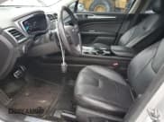 ✅ 2015 Ford Fusion Titanium • VIN: 3FA6P0K91FR279510 • Лот: 52875435. Опубликован ранее на Copart с пробегом 93 519 миль. Бесплатный доступ к архиву аукционных продаж из США и подробный отчёт об истории автомобиля на DreamBid. Изображение 7.