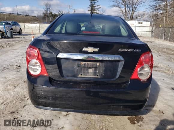 2012 Chevrolet Sonic LTZ с VIN 1G1JE5SH3C4149210, выставлен на аукционе Copart как лот 61470005 с пробегом 166 902 миль миль и Списание • Salvage title. История ставок и продаж доступна на DreamBid. Изображение 6.