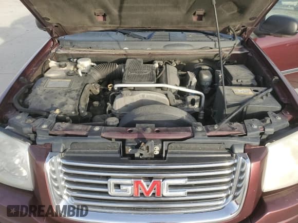 ✅ 2007 GMC Envoy SLT • VIN: 1GKDT13S672191325 • Lot: 91311245. Wystawiony na Copart z przebiegiem 171 311 mil. Bezpłatny archiwum sprzedaży aukcyjnych z USA i szczegółowy raport historii pojazdu na DreamBid. Zdjęcie 12.