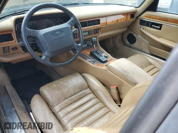 ✅ 1994 Jaguar XJS • VIN: SAJNX2748RC192688 • Лот: 44819395. Опубликован ранее на Copart с пробегом 103 940 миль. Бесплатный доступ к архиву аукционных продаж из США и подробный отчёт об истории автомобиля на DreamBid. Изображение 8.