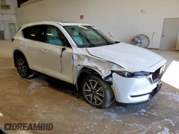 ✅ 2018 Mazda CX-5 Grand Touring • VIN: JM3KFBDM7J0344272 • Лот: 81642645. Опубликован ранее на Copart с пробегом 80 955 миль. Бесплатный доступ к архиву аукционных продаж из США и подробный отчёт об истории автомобиля на DreamBid. Изображение 4.