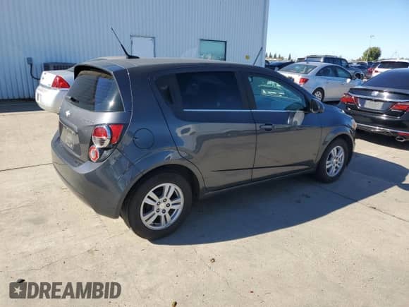 2013 Chevrolet Sonic LT with VIN 1G1JC6SG6D4230173, listed as a Copart auction lot 82782885 with 190,906 mi miles and Salvage title. Bid and sale history available at DreamBid. Image 3.