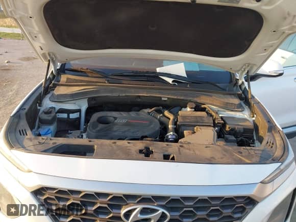 2020 Hyundai Santa Fe SEL z VIN 5NMS3CAAXLH216029, wystawiony jako IAAI lot #43222450 z przebiegiem 70 337 mil mil oraz . Historia ofert i sprzedaży dostępna na DreamBid. Obrazek 10.