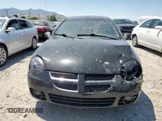 2003 Dodge Neon SXT z VIN 1B3ES56C13D214833, wystawiony jako Copart lot #60065175 z przebiegiem 237 811 mil mil oraz Szkoda całkowita • Salvage title. Historia ofert i sprzedaży dostępna na DreamBid. Obrazek 5.