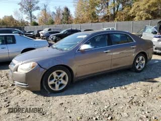✅ 2010 Chevrolet Malibu 1LT • VIN: 1G1ZC5E02AF243983 • Lot: 37243384. Listed on Copart with 157,502 mi. Free auction sales archive from the USA and detailed vehicle history report at DreamBid. Image 1.