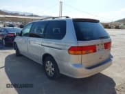 ✅ 2004 Honda Odyssey EX-RES • VIN: 5FNRL18874B089202 • Lot: 43184759. Listed on IAAI with 102,400 mi. Free auction sales archive from the USA and detailed vehicle history report at DreamBid. Image 3.