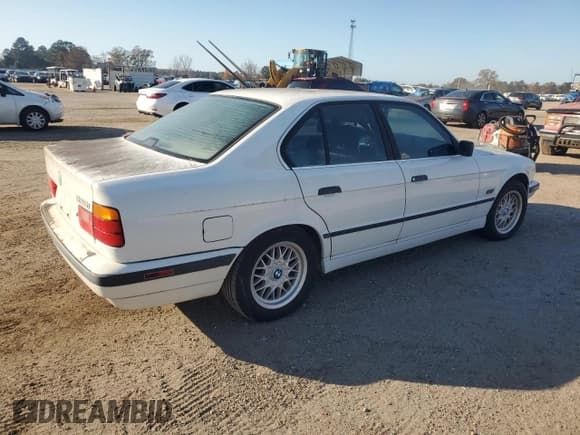 ✅ 1995 BMW 5 Series 525i • VIN: WBAHD5329SGB39457 • Lot: 84928964. Listed on Copart with 136,095 mi. Free auction sales archive from the USA and detailed vehicle history report at DreamBid. Image 3.