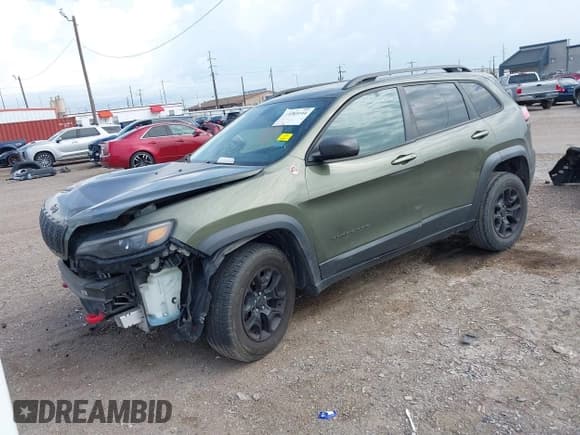 ✅ 2019 Jeep Cherokee Trailhawk • VIN: 1C4PJMBX7KD200334 • Лот: 43383144. Опубликован ранее на IAAI с пробегом 245 711 миль. Бесплатный доступ к архиву аукционных продаж из США и подробный отчёт об истории автомобиля на DreamBid. Изображение 2.