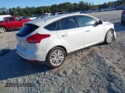 ✅ 2016 Ford Focus Titanium • VIN: 1FADP3N22GL344405 • Lot: 43612764. Listed on IAAI with 60,636 mi. Free auction sales archive from the USA and detailed vehicle history report at DreamBid. Image 4.