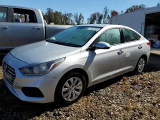 ✅ 2022 Hyundai Accent SE • VIN: 3KPC24A68NE157730 • Лот: 77031304. Опубликован ранее на Copart с пробегом 74 908 миль. Бесплатный доступ к архиву аукционных продаж из США и подробный отчёт об истории автомобиля на DreamBid. Изображение 1.