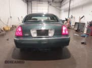 ✅ 1998 Lincoln Town Car Signature • VIN: 1LNFM82W8WY720232 • Lot: 42125723. Listed on IAAI with 132,494 mi. Free auction sales archive from the USA and detailed vehicle history report at DreamBid. Image 17.