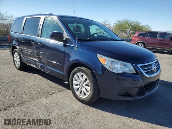 ✅ 2014 Volkswagen Routan SE • VIN: 2C4RVABG6ER134498 • Lot: 86527735. Listed on Copart with 203,477 mi. Free auction sales archive from the USA and detailed vehicle history report at DreamBid. Image 4.