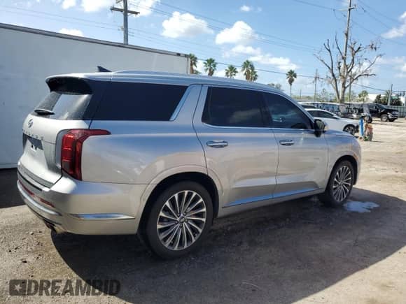 2023 Hyundai Palisade Calligraphy с VIN KM8R74GE4PU597177, выставлен на аукционе Copart как лот 77450264 с пробегом 21 616 миль миль и Списание • Salvage title. История ставок и продаж доступна на DreamBid. Изображение 3.