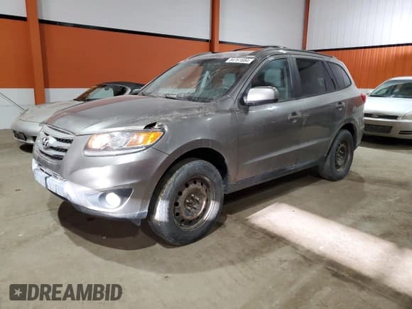 ✅ 2012 Hyundai Santa Fe GLS • VIN: 5XYZGDAB2CG164617 • Lot: 84761684. Listed on Copart with 226,387 mi. Free auction sales archive from the USA and detailed vehicle history report at DreamBid. Image 1.