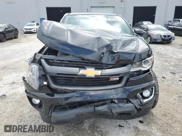 ✅ 2018 Chevrolet Colorado 4WD Z71 • VIN: 1GCGTDEN2J1213450 • Лот: 70975404. Опубликован ранее на Copart с пробегом 46 307 миль. Бесплатный доступ к архиву аукционных продаж из США и подробный отчёт об истории автомобиля на DreamBid. Изображение 5.