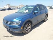 ✅ 2018 Volkswagen Tiguan S • VIN: 3VV0B7AXXJM015331 • Lot: 42012557. Listed on IAAI with 80,288 mi. Free auction sales archive from the USA and detailed vehicle history report at DreamBid. Image 2.