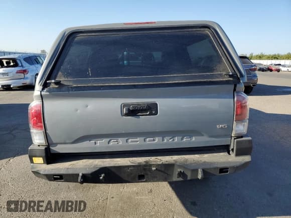 ✅ 2021 Toyota Tacoma SR • VIN: 3TYSZ5AN3MT026203 • Lot: 64865335. Wystawiony na Copart z przebiegiem 87 517 mil. Bezpłatny archiwum sprzedaży aukcyjnych z USA i szczegółowy raport historii pojazdu na DreamBid. Zdjęcie 6.