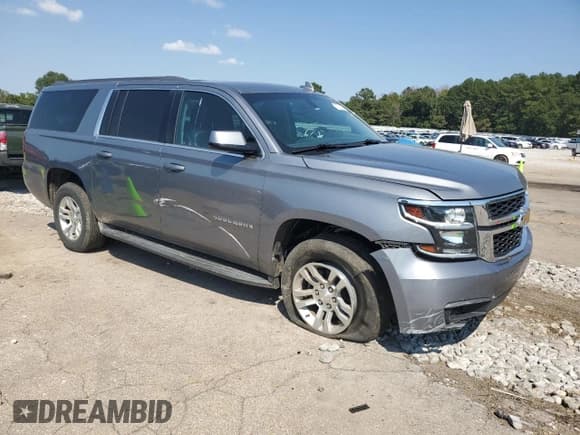 ✅ 2018 Chevrolet Suburban LS • VIN: 1GNSCGKC6JR354626 • Lot: 73721314. Wystawiony na Copart z przebiegiem 127 029 mil. Bezpłatny archiwum sprzedaży aukcyjnych z USA i szczegółowy raport historii pojazdu na DreamBid. Zdjęcie 4.