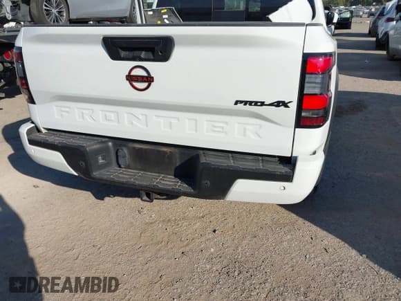 ✅ 2023 Nissan Frontier Pro-4X • VIN: 1N6ED1EKXPN662561 • Lot: 43432334. Listed on IAAI with 73,303 mi. Free auction sales archive from the USA and detailed vehicle history report at DreamBid. Image 17.