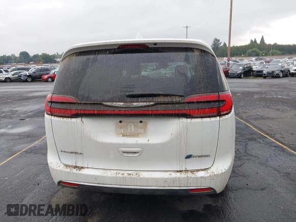 ✅ 2022 Chrysler Pacifica Hybrid Touring L • VIN: 2C4RC1L70NR121525 • Лот: 43166737. Опубликован ранее на IAAI с пробегом 98 309 миль. Бесплатный доступ к архиву аукционных продаж из США и подробный отчёт об истории автомобиля на DreamBid. Изображение 16.