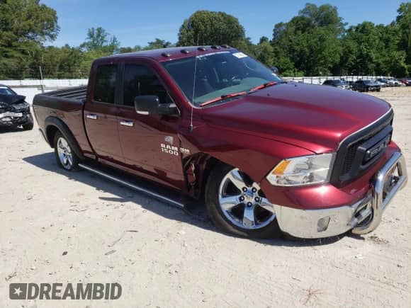 2018 Ram 1500 SLT with VIN 1C6RR7GT3JS348541, listed as a Copart auction lot 57144935 with 105,497 mi miles and Salvage title. Bid and sale history available at DreamBid. Image 4.