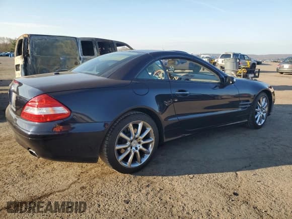 ✅ 2007 Mercedes-Benz SL 550 • VIN: WDBSK71FX7F134907 • Lot: 51100175. Listed on Copart with 133,355 mi. Free auction sales archive from the USA and detailed vehicle history report at DreamBid. Image 3.