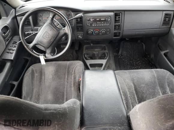 2002 Dodge Dakota SLT z VIN 1B7HG48N42S711374, wystawiony jako Copart lot #68991894 z przebiegiem Nie podano mil oraz Czysty tytuł • Clean title. Historia ofert i sprzedaży dostępna na DreamBid. Obrazek 8.