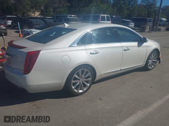 ✅ 2013 Cadillac XTS Premium • VIN: 2G61T5S37D9101356 • Lot: 43327677. Listed on IAAI with 53,803 mi. Free auction sales archive from the USA and detailed vehicle history report at DreamBid. Image 4.