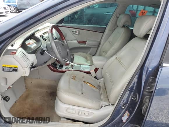 2006 Hyundai Azera SE с VIN KMHFC46F36A129241, выставлен на аукционе Copart как лот 51295615 с пробегом Не указан миль и Списание • Salvage title. История ставок и продаж доступна на DreamBid. Изображение 7.