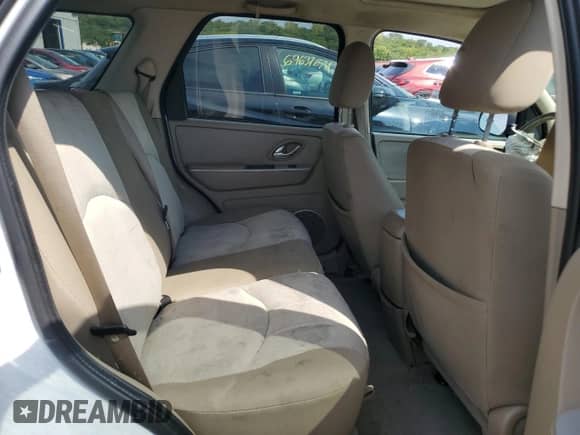 2005 Mercury Mariner Luxury с VIN 4M2YU56175DJ08419, выставлен на аукционе Copart как лот 69509144 с пробегом Не указан миль и Списание • Salvage title. История ставок и продаж доступна на DreamBid. Изображение 11.