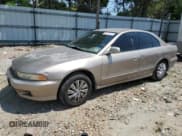 ✅ 2000 Mitsubishi Galant ES • VIN: 4A3AA46G1YE023862 • Lot: 61449105. Wystawiony na Copart z przebiegiem 206 364 mil. Bezpłatny archiwum sprzedaży aukcyjnych z USA i szczegółowy raport historii pojazdu na DreamBid. Zdjęcie 1.