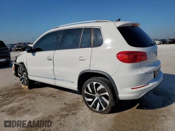 ✅ 2017 Volkswagen Tiguan Sport • VIN: WVGTV7AX7HK011317 • Лот: 80454325. Опубликован ранее на Copart с пробегом 88 351 миль. Бесплатный доступ к архиву аукционных продаж из США и подробный отчёт об истории автомобиля на DreamBid. Изображение 2.