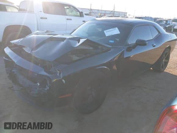 ✅ 2015 Dodge Challenger SXT • VIN: 2C3CDZAG4FH901110 • Lot: 43562137. Listed on IAAI with 121,046 mi. Free auction sales archive from the USA and detailed vehicle history report at DreamBid. Image 2.