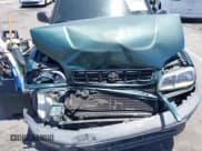 ✅ 1998 Toyota RAV4 • VIN: JT3GP10V7W0034249 • Lot: 42327932. Wystawiony na IAAI z przebiegiem 261 840 mil. Bezpłatny archiwum sprzedaży aukcyjnych z USA i szczegółowy raport historii pojazdu na DreamBid. Zdjęcie 6.